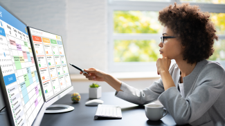 woman looking at a monitor